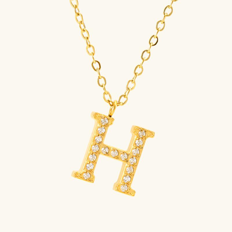 Valantomode | Plated Stainless Steel Typographic Necklace with Refractive Stone Asset