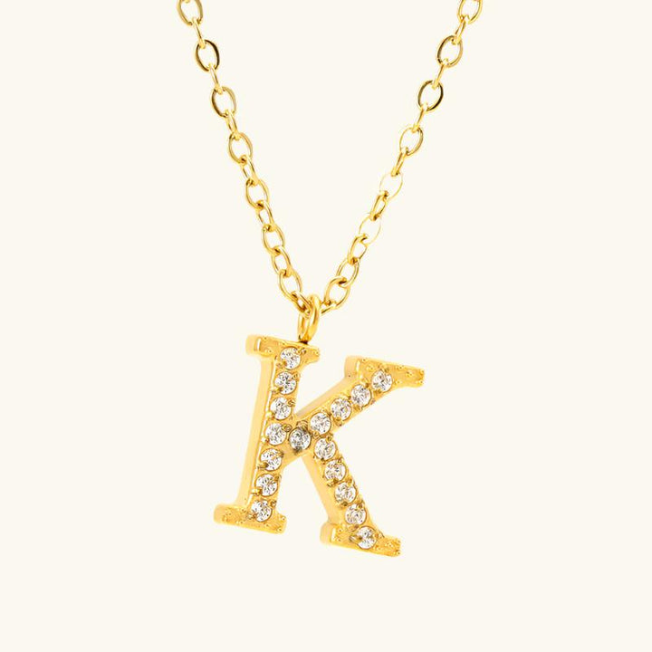 Valantomode | Plated Stainless Steel Typographic Necklace with Refractive Stone Asset