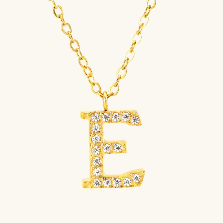 Valantomode | Plated Stainless Steel Typographic Necklace with Refractive Stone Asset
