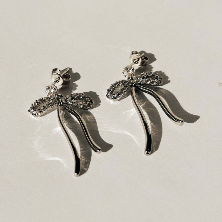 Valantomode | Plated Bow Motif Earrings with CZ Stones for Women