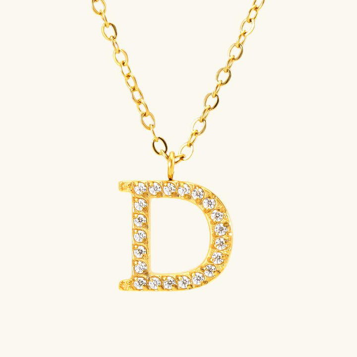 Valantomode | Plated Stainless Steel Typographic Necklace with Refractive Stone Asset