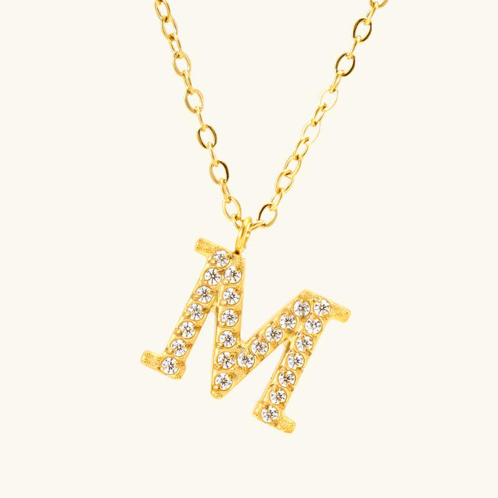 Valantomode | Plated Stainless Steel Typographic Necklace with Refractive Stone Asset