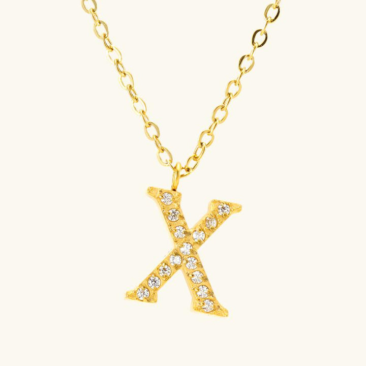 Valantomode | Plated Stainless Steel Typographic Necklace with Refractive Stone Asset