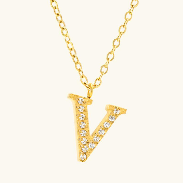 Valantomode | Plated Stainless Steel Typographic Necklace with Refractive Stone Asset