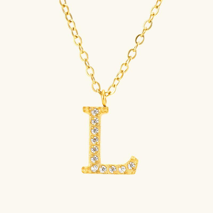 Valantomode | Plated Stainless Steel Typographic Necklace with Refractive Stone Asset