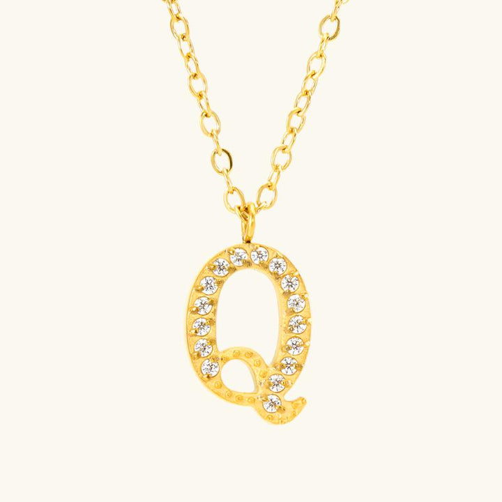Valantomode | Plated Stainless Steel Typographic Necklace with Refractive Stone Asset