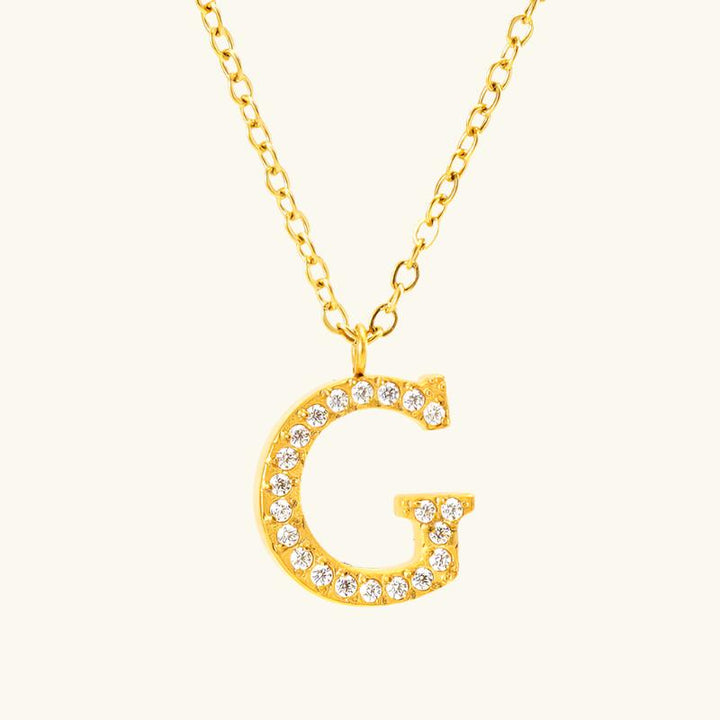 Valantomode | Plated Stainless Steel Typographic Necklace with Refractive Stone Asset