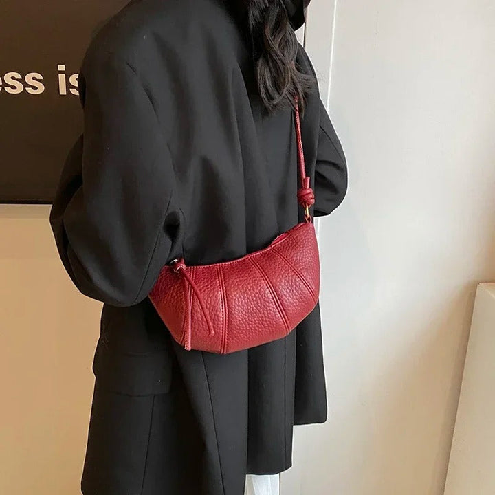 Valantomode | Aura Crescent Crossbody – Premium Vegan Leather Curved Shoulder Bag with Gold-Tone Accents