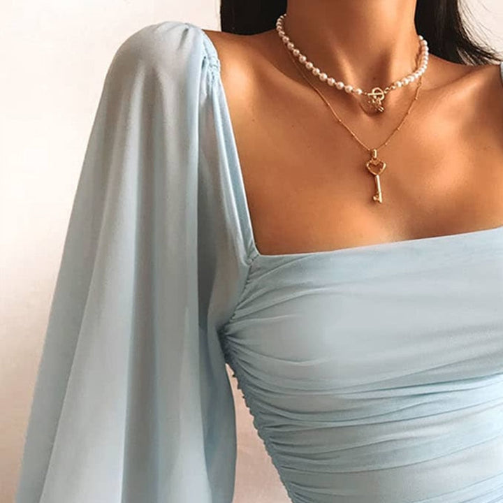 Valantomode | Chic Light Blue Mini Dress with Puff Sleeves for Women