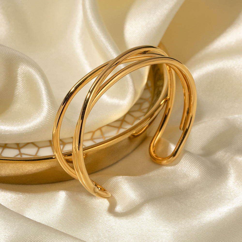 Valantomode | Gold Plated Intertwined Bangle for Women