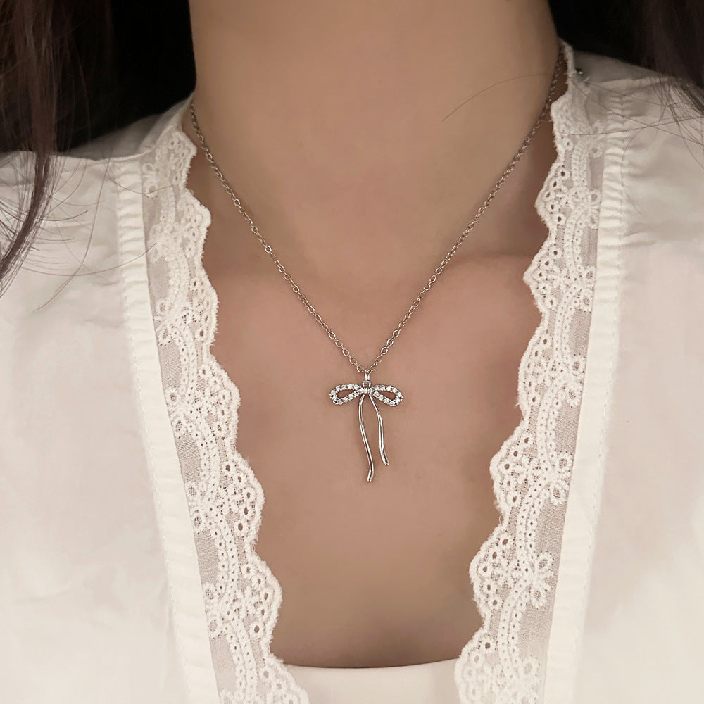 Valantomode | Plated Bow Motif Necklace with CZ Stones for Women