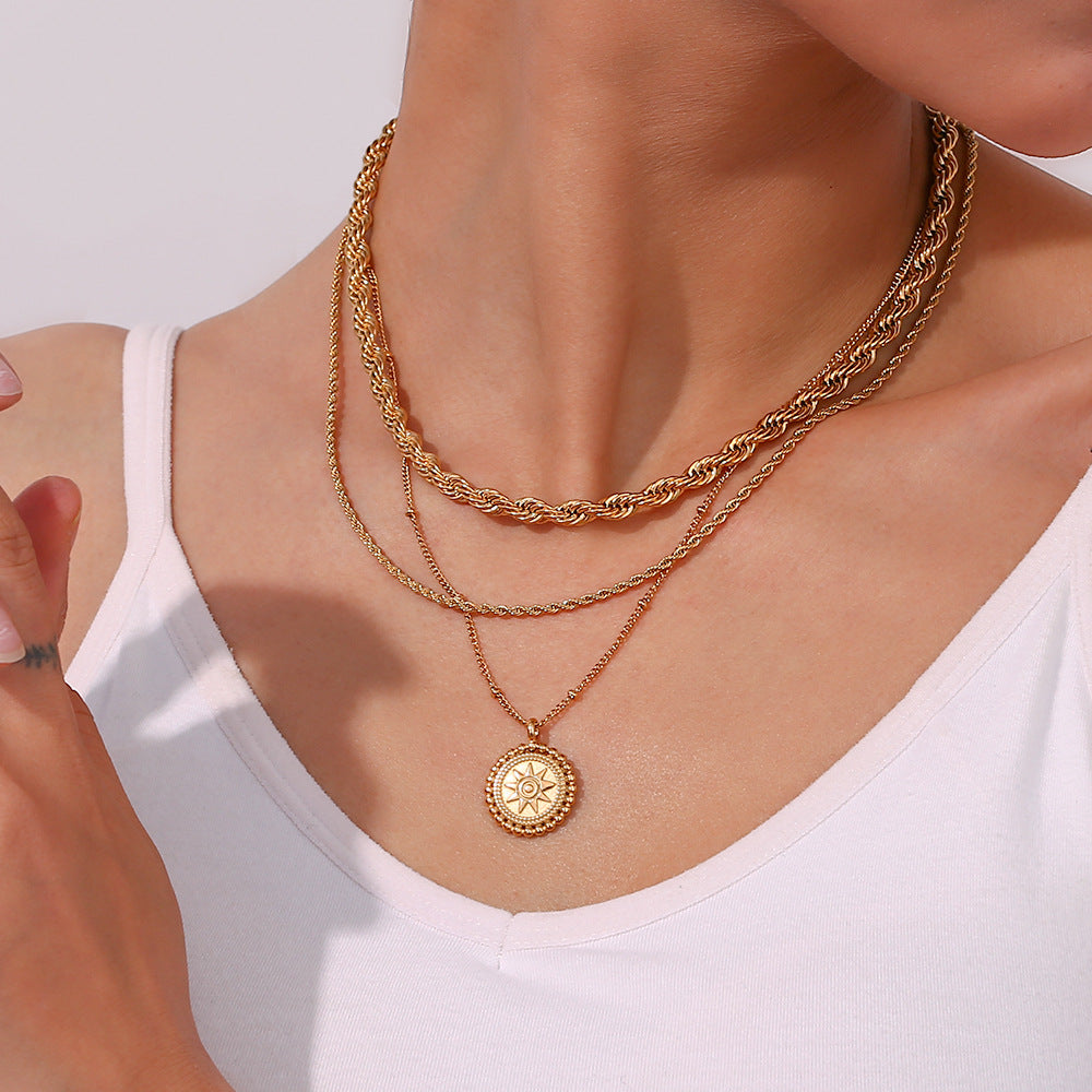 Valantomode | Plated Sunburst Pendant Necklace with Radial Solar Structuralism