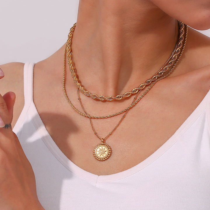 Valantomode | Plated Sunburst Pendant Necklace with Radial Solar Structuralism