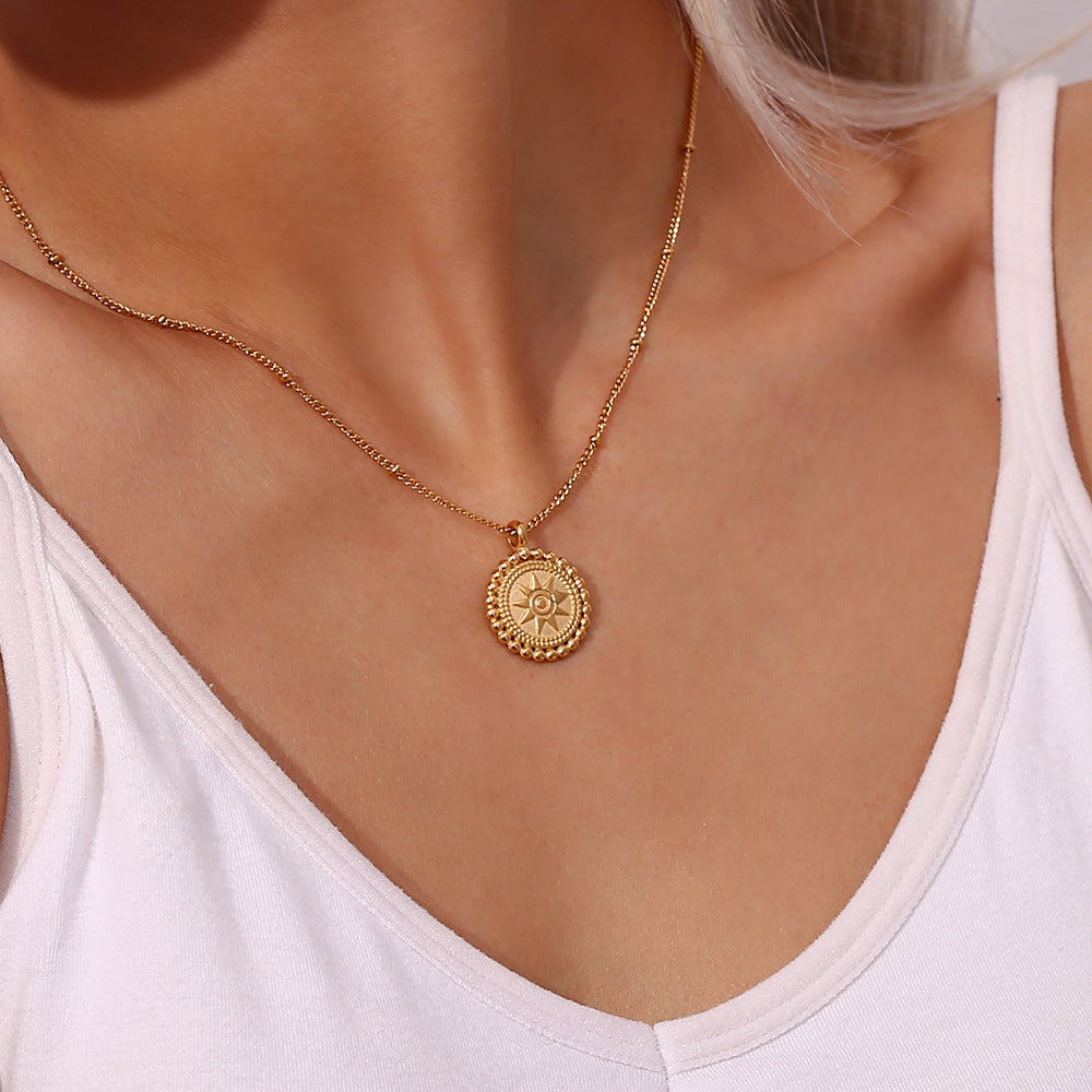 Valantomode | Plated Sunburst Pendant Necklace with Radial Solar Structuralism