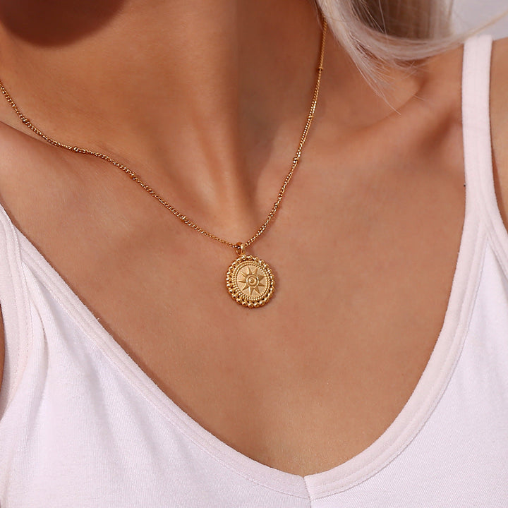 Valantomode | Plated Sunburst Pendant Necklace with Radial Solar Structuralism