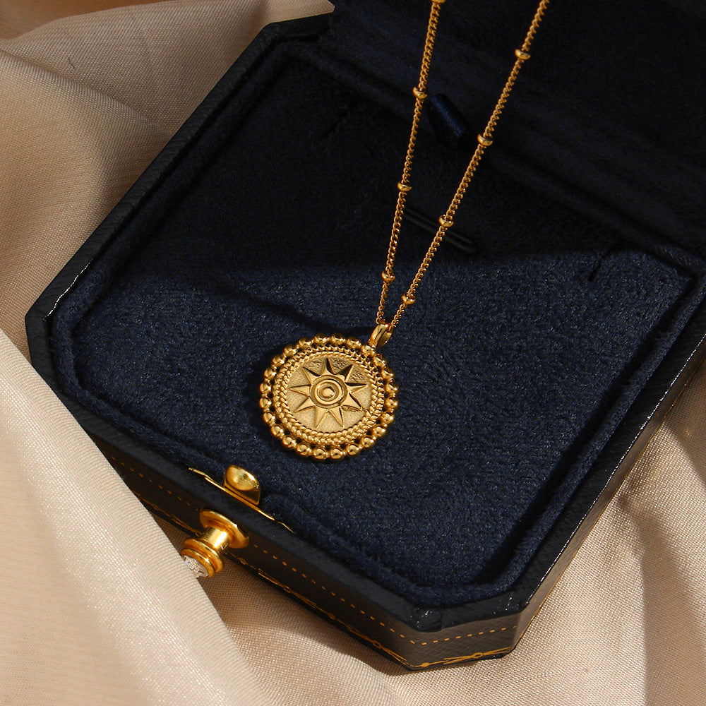 Valantomode | Plated Sunburst Pendant Necklace with Radial Solar Structuralism