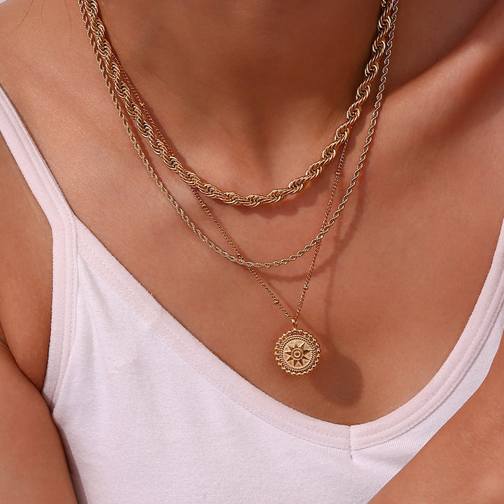 Valantomode | Plated Sunburst Pendant Necklace with Radial Solar Structuralism