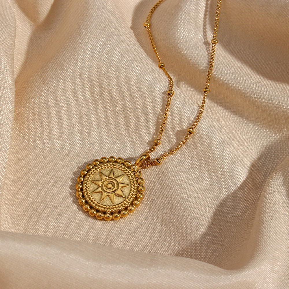 Valantomode | Plated Sunburst Pendant Necklace with Radial Solar Structuralism