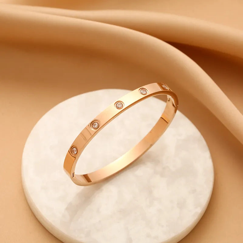 Valantomode | Heavyweight Gold Plated CZ Love Bangle for Women