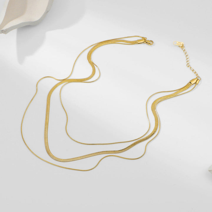 Valantomode | Triple Radiant Focal Array – High-Lustre Gold Plated Triple Layered Multi-Length Command Necklace