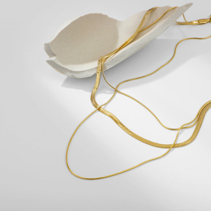 Valantomode | Triple Radiant Focal Array – High-Lustre Gold Plated Triple Layered Multi-Length Command Necklace