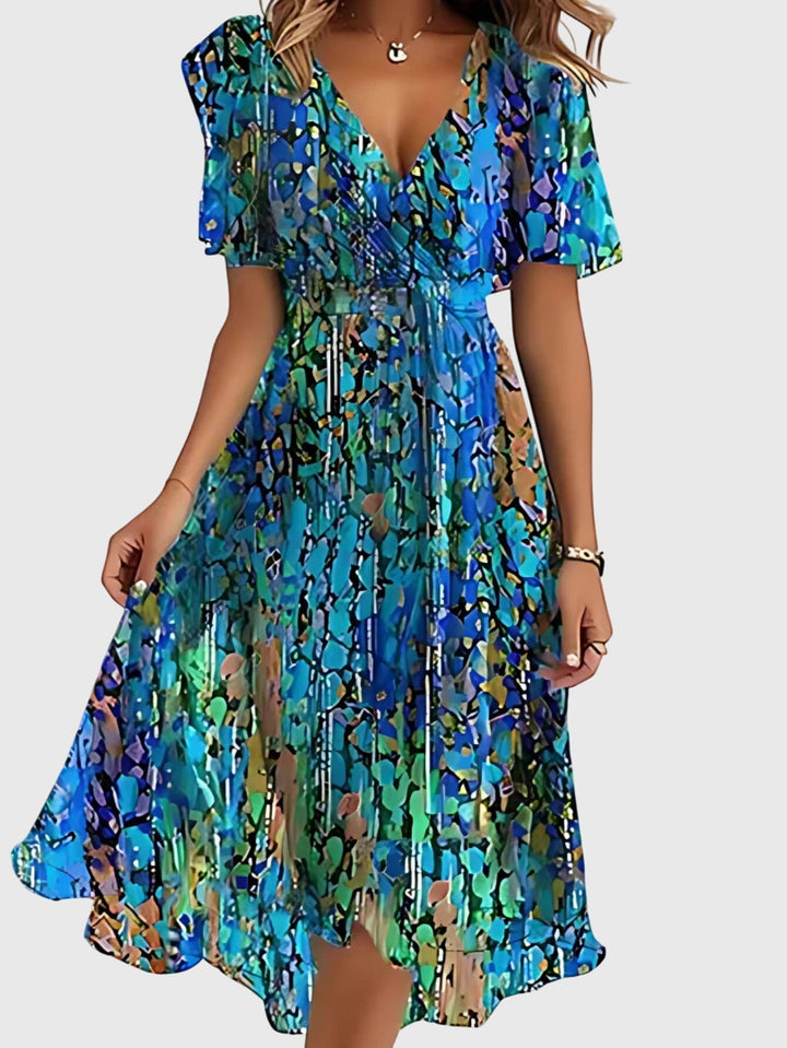 Valantomode | Chic Summer Dress Offering a Stylish Belly Cover Design
