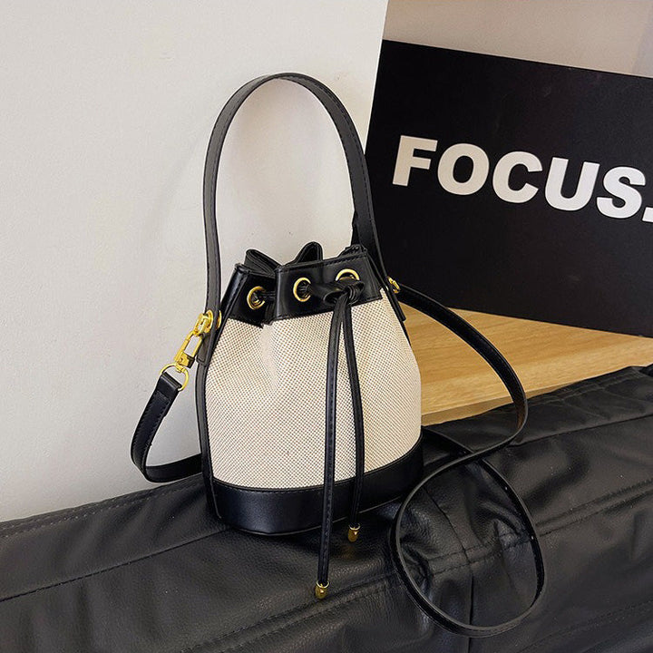 Valantomode | Odyssey Cyclus Courier – Premium Canvas & Vegan Leather Hybrid Mini Bucket Bag
