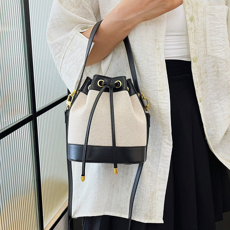 Valantomode | Odyssey Cyclus Courier – Premium Canvas & Vegan Leather Hybrid Mini Bucket Bag