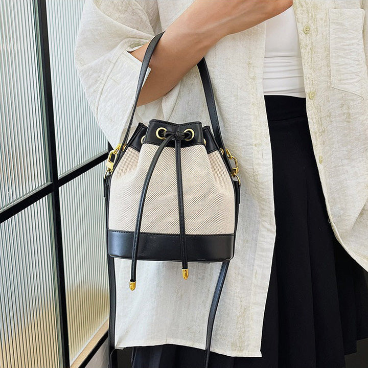 Valantomode | Odyssey Cyclus Courier – Premium Canvas & Vegan Leather Hybrid Mini Bucket Bag
