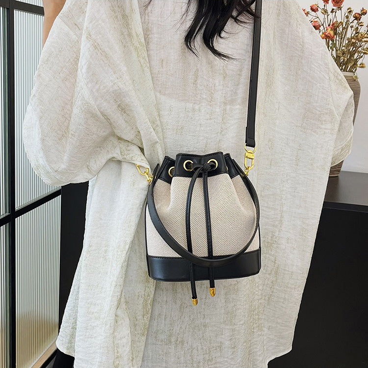 Valantomode | Odyssey Cyclus Courier – Premium Canvas & Vegan Leather Hybrid Mini Bucket Bag