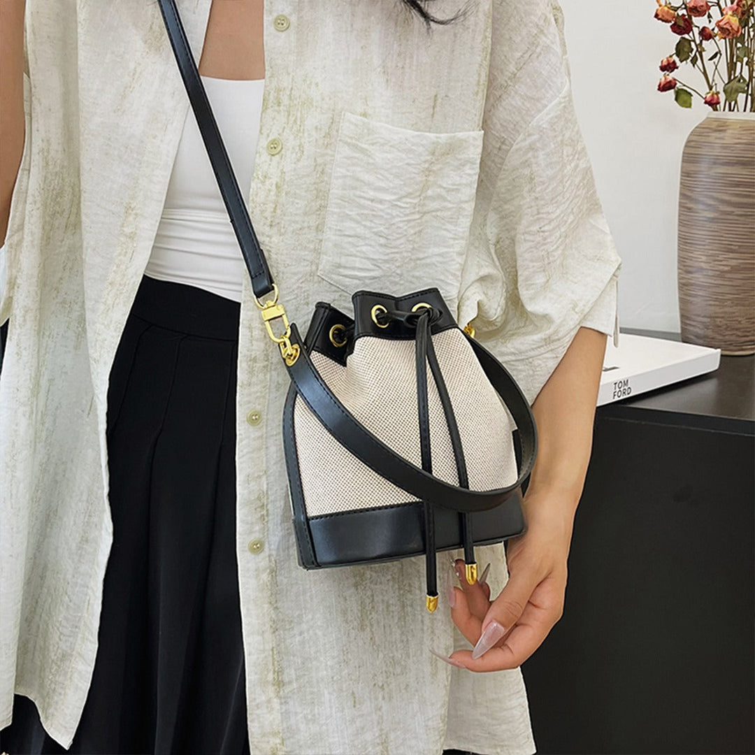 Valantomode | Odyssey Cyclus Courier – Premium Canvas & Vegan Leather Hybrid Mini Bucket Bag