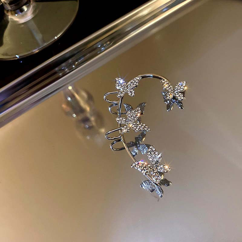 Valantomode | Plated Sculptural Butterfly Earrings with High-Refractive Stone Assets