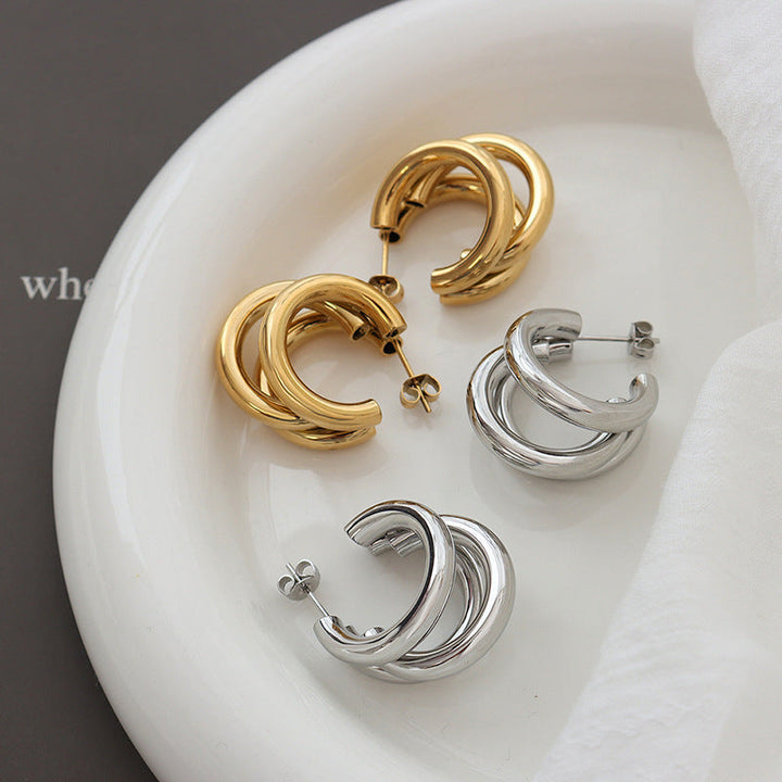 Valantomode | Plated Venice Earrings with Parabolic Arch Architecture and Volumetric Geometry