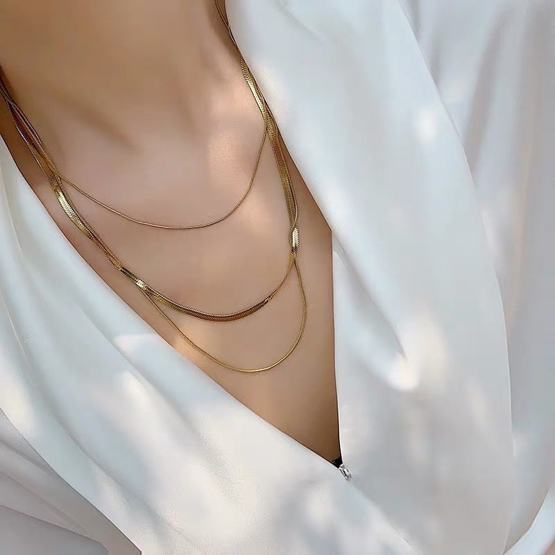 Valantomode | Triple Radiant Focal Array – High-Lustre Gold Plated Triple Layered Multi-Length Command Necklace