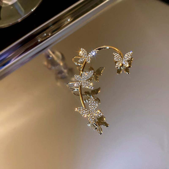 Valantomode | Plated Sculptural Butterfly Earrings with High-Refractive Stone Assets
