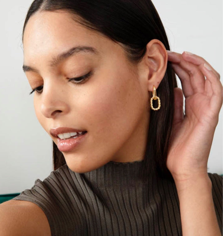 Valantomode | Plated Lauren Drop Hoop Earrings with Helical Torsion Architecture and Oval Geometry
