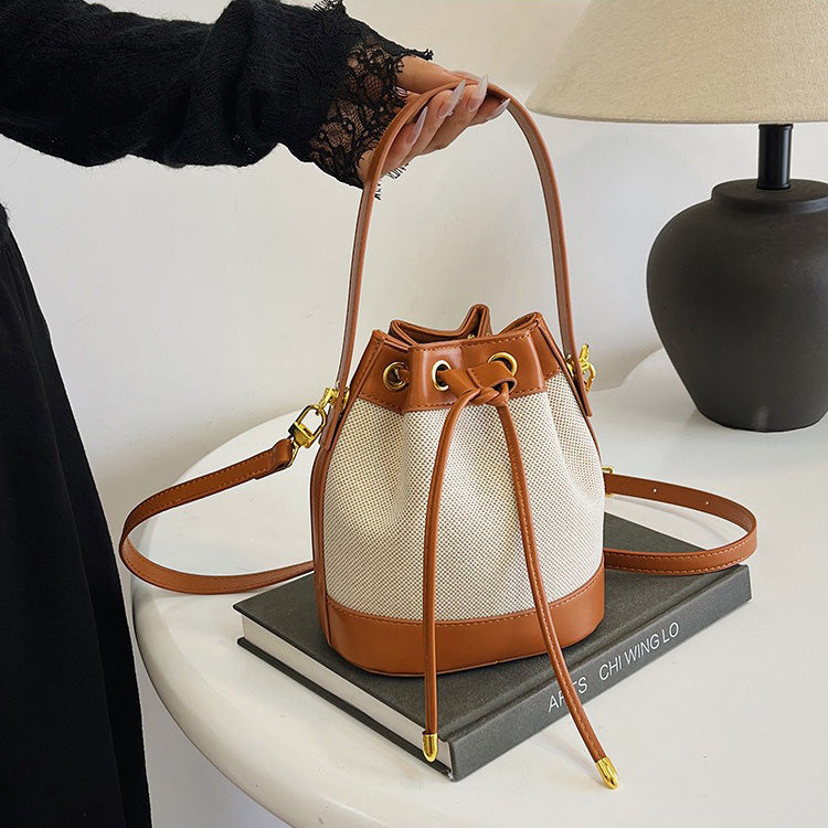 Valantomode | Odyssey Cyclus Courier – Premium Canvas & Vegan Leather Hybrid Mini Bucket Bag