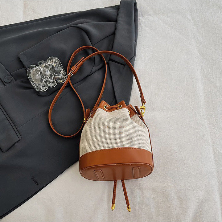 Valantomode | Odyssey Cyclus Courier – Premium Canvas & Vegan Leather Hybrid Mini Bucket Bag