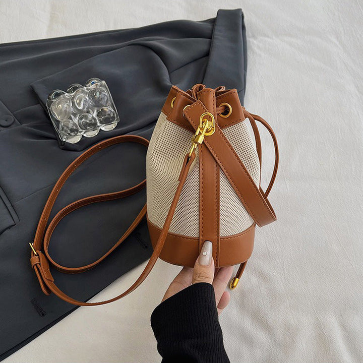 Valantomode | Odyssey Cyclus Courier – Premium Canvas & Vegan Leather Hybrid Mini Bucket Bag