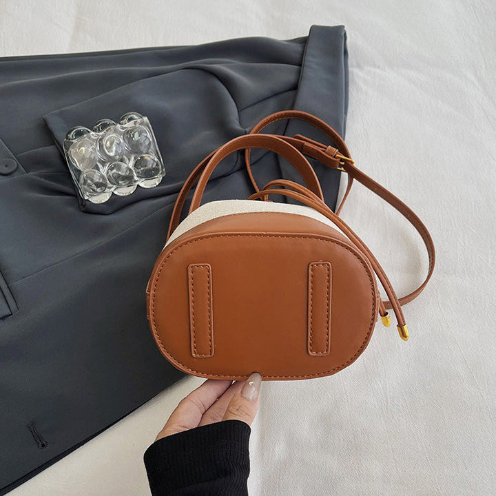 Valantomode | Odyssey Cyclus Courier – Premium Canvas & Vegan Leather Hybrid Mini Bucket Bag