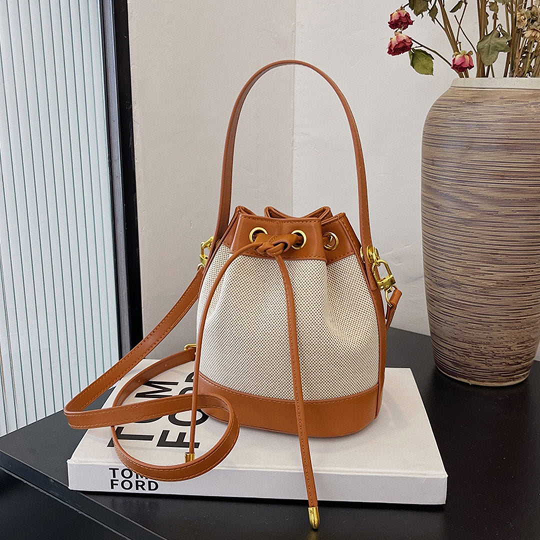 Valantomode | Odyssey Cyclus Courier – Premium Canvas & Vegan Leather Hybrid Mini Bucket Bag