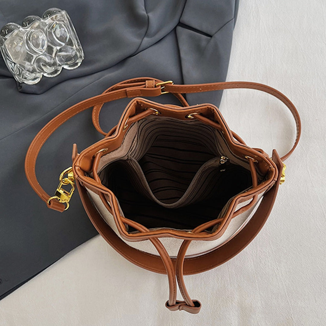Valantomode | Odyssey Cyclus Courier – Premium Canvas & Vegan Leather Hybrid Mini Bucket Bag