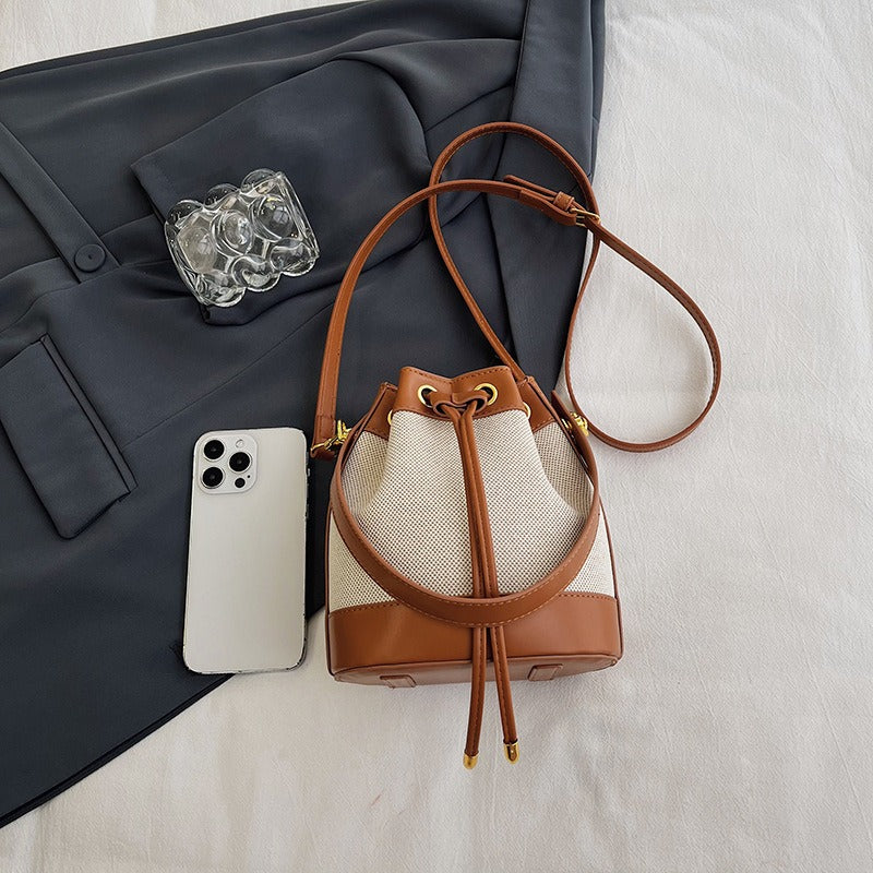 Valantomode | Odyssey Cyclus Courier – Premium Canvas & Vegan Leather Hybrid Mini Bucket Bag