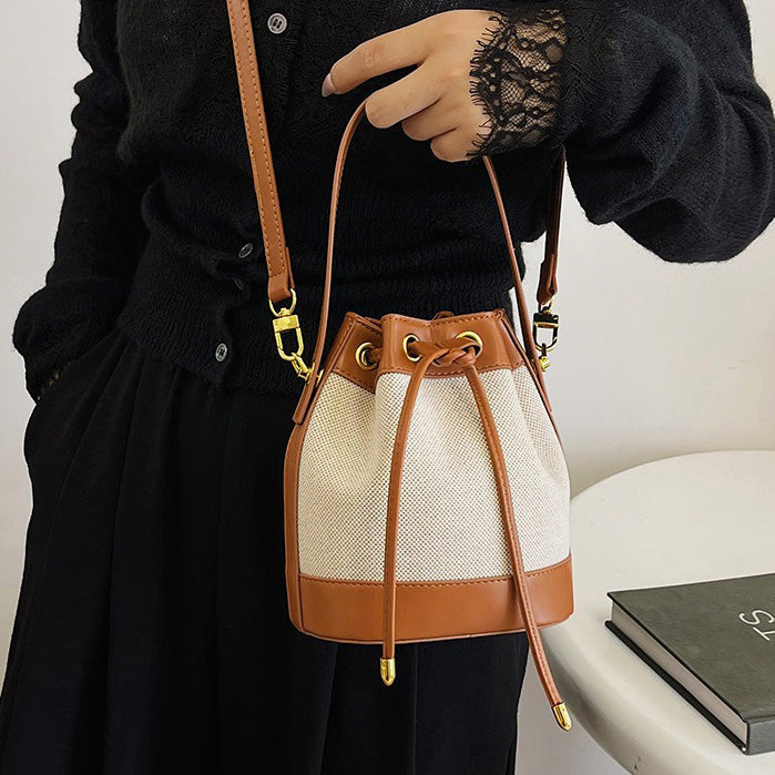Valantomode | Odyssey Cyclus Courier – Premium Canvas & Vegan Leather Hybrid Mini Bucket Bag