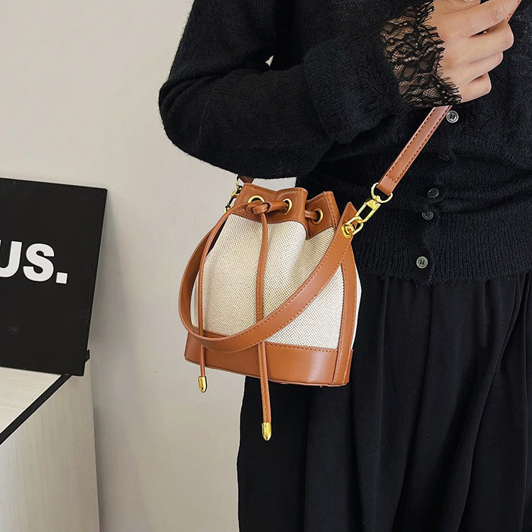 Valantomode | Odyssey Cyclus Courier – Premium Canvas & Vegan Leather Hybrid Mini Bucket Bag