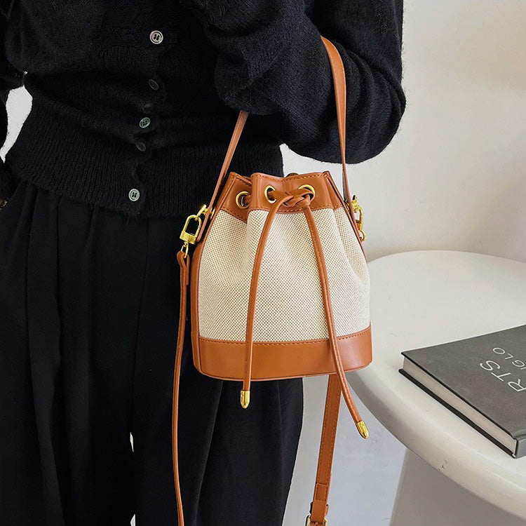 Valantomode | Odyssey Cyclus Courier – Premium Canvas & Vegan Leather Hybrid Mini Bucket Bag