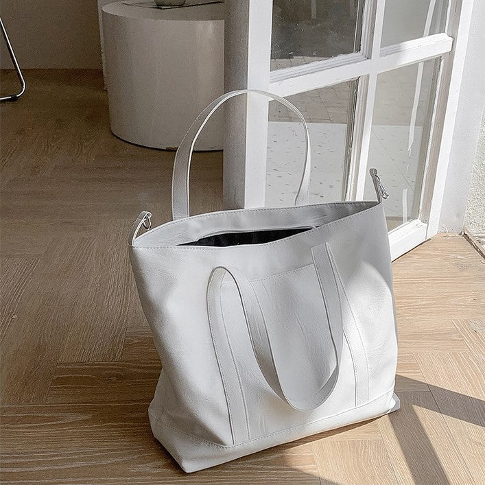 Valantomode | The ‘Aurelius’ Fluid Tote – Veridian Grace & Kinetic Command